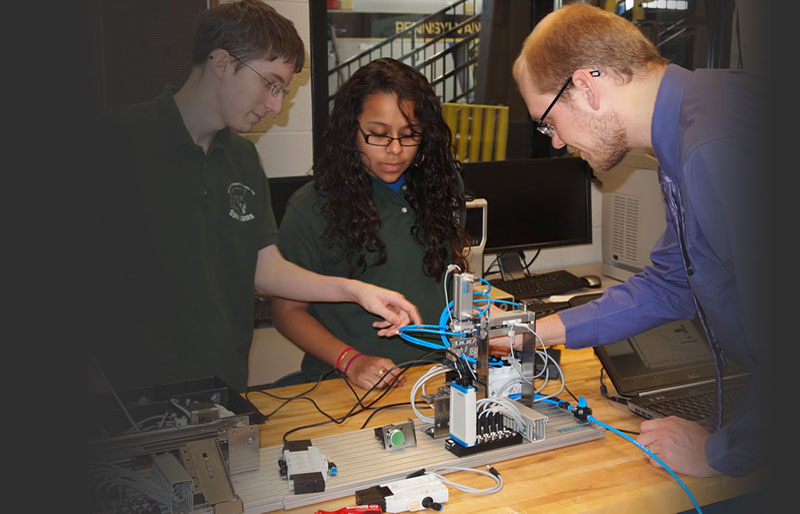 Three Engineering Technology Students